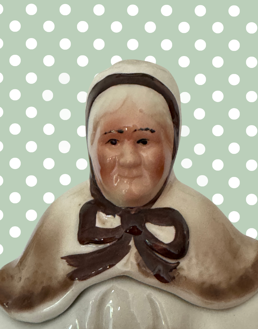 Close-up of Little Old Lady face and bonnet detail on vintage Tony Wood Staffordshire pottery teapot