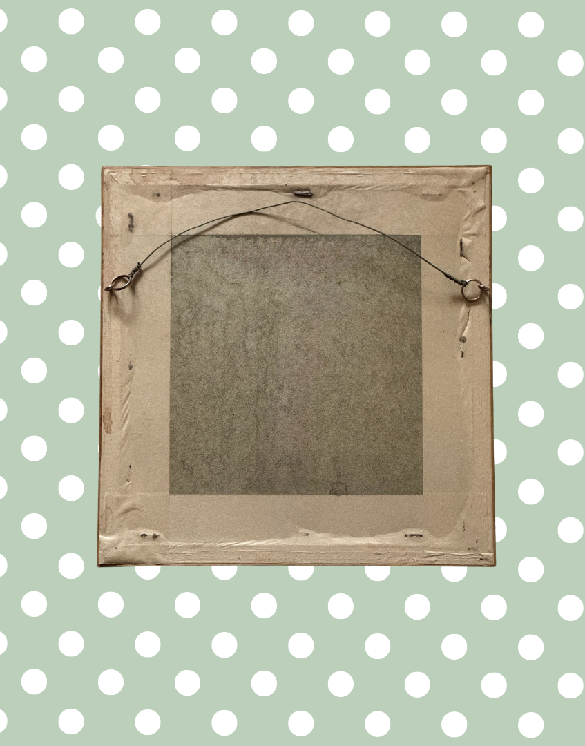 Reverse of vintage cottagecore embroidery frame showing wooden backing and hanging fixture detail