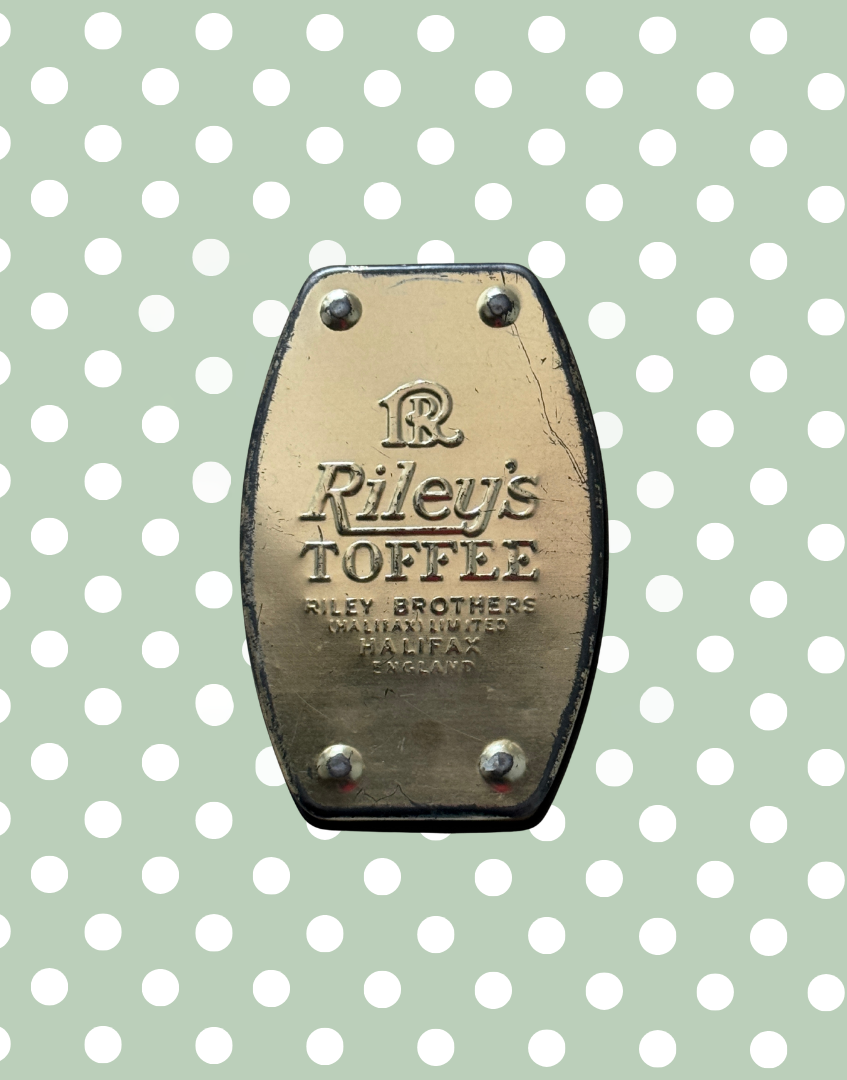 Base of 1930s Rileys Toffee Little Red Riding Hood tin showing Thorne Toffee makers branding and vintage metal base detail