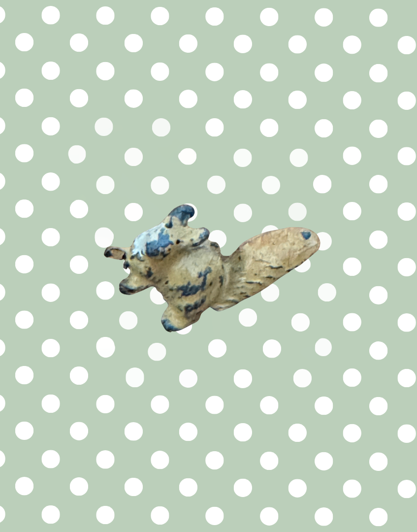 small figurine of a light brown hand painted Britains vintage toy ephemera