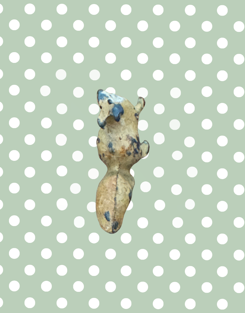 overhead view of rare britains squirrel collectable toy