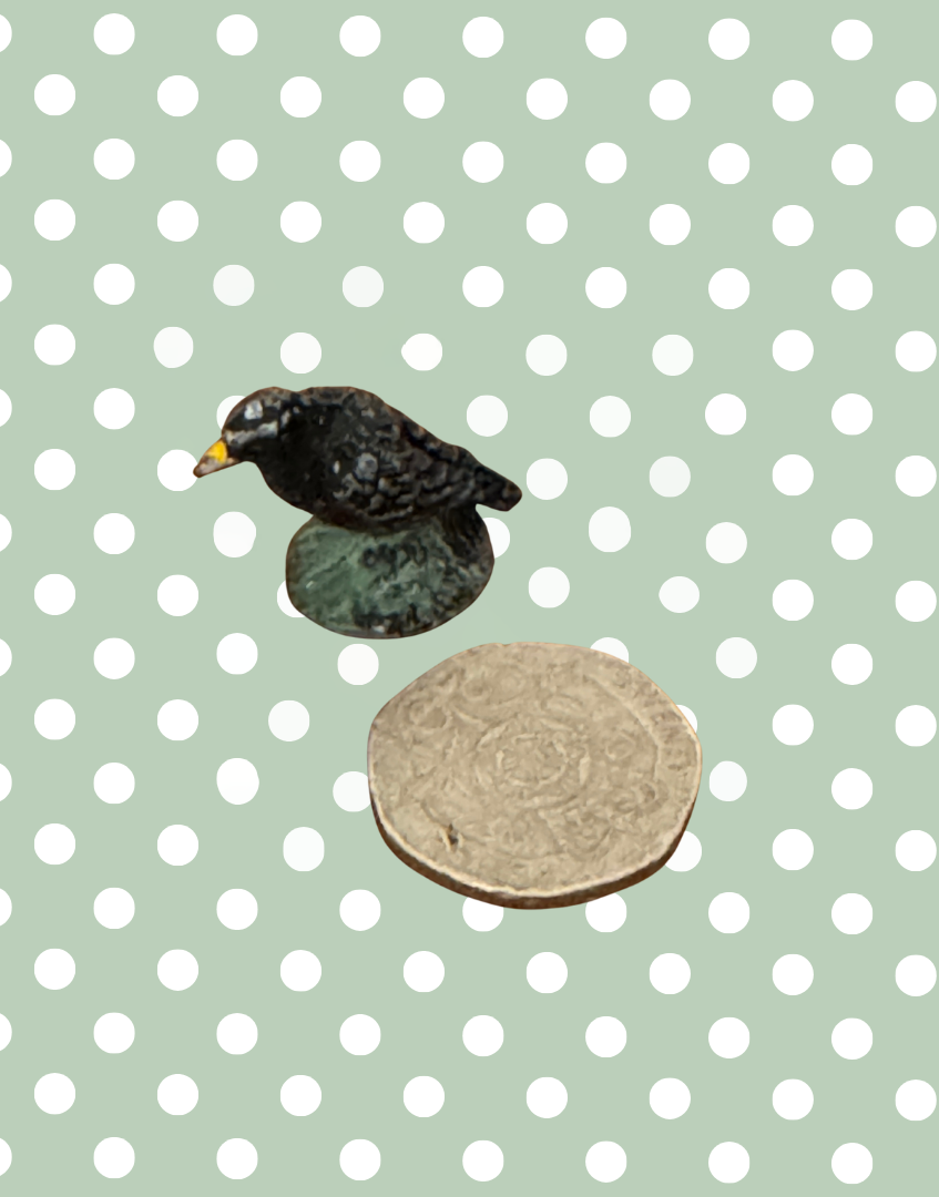 1920s Hand-Painted Lead Vintage Bird Figurine Next to Tenty Pence Coin for Scale