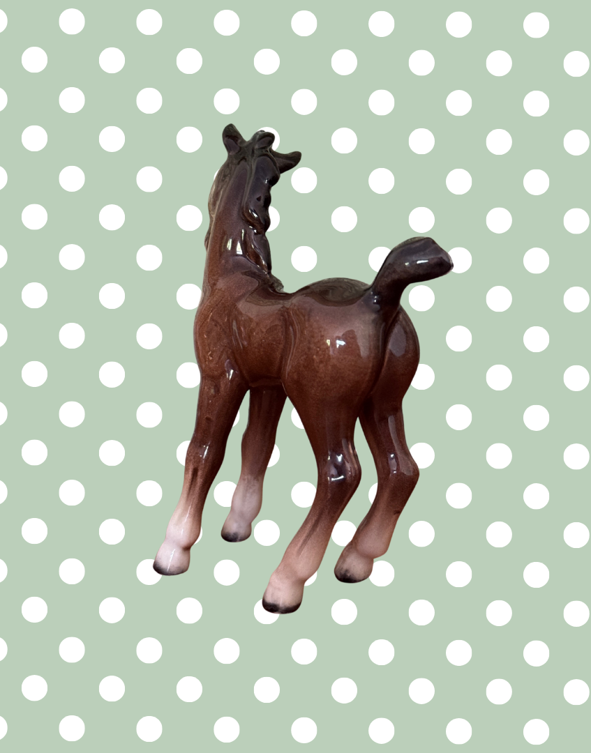 Rear view of glossy ceramic Beswick foal ceramic ornament