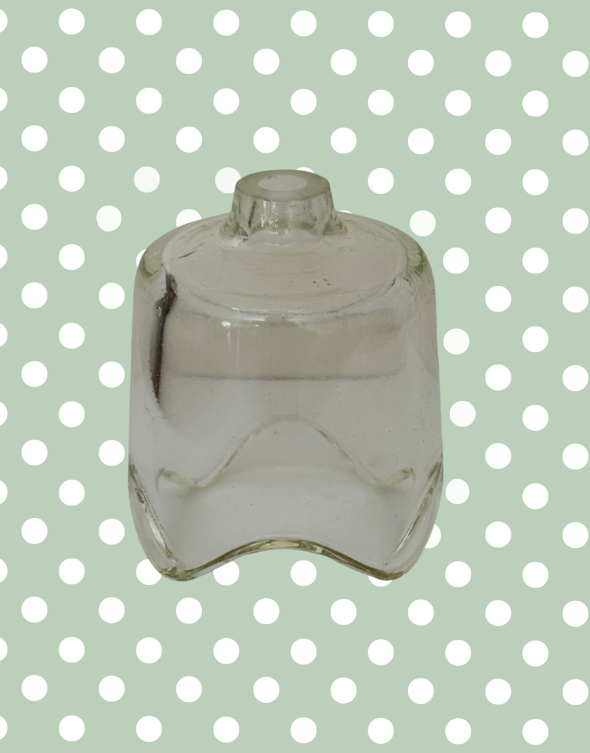 Side profile of vintage Pyrex glass pie funnel.