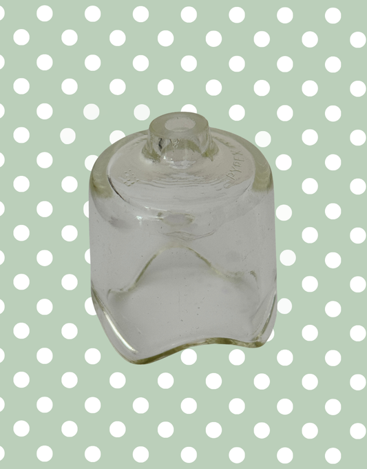 Vintage large Pyrex glass pie funnel for traditional home baking.