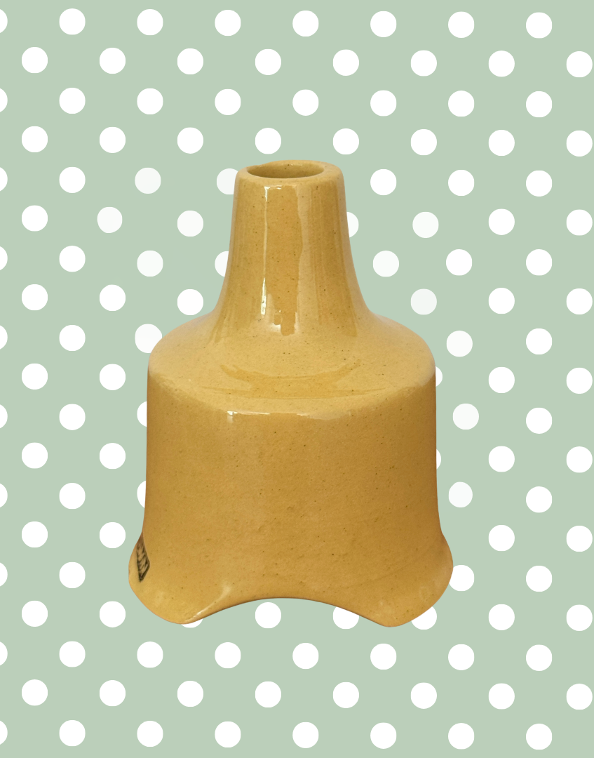 Side profile of vintage Nutbrown mustard yellow pie vent.