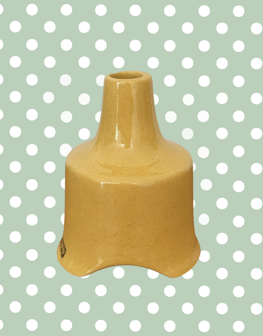 Side profile of vintage Nutbrown mustard yellow pie vent.