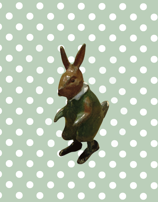 Lead hand painted brown rabbit in green dress pre war collectable toy