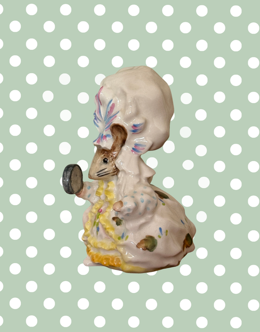 Side view of vintage Beswick Lady Mouse figurine showing hand-painted dress, bonnet and porcelain detailing