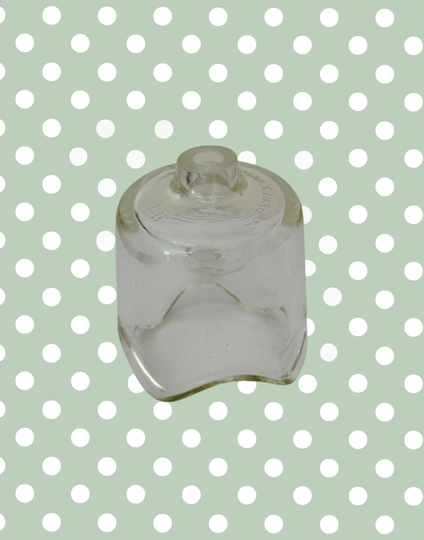 Vintage large Pyrex glass pie funnel for traditional home baking.