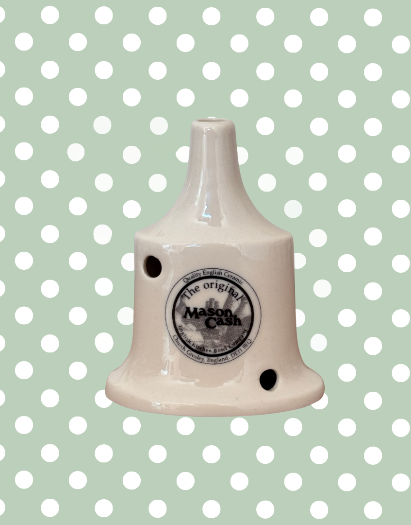 Ceramic British pie funnel with 'Mason Cash' branding 