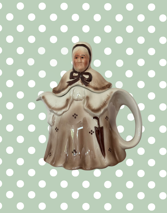 Vintage brown Tony Wood Staffordshire pottery Little Old Lady teapot with umbrella handle and bonnet detail front view