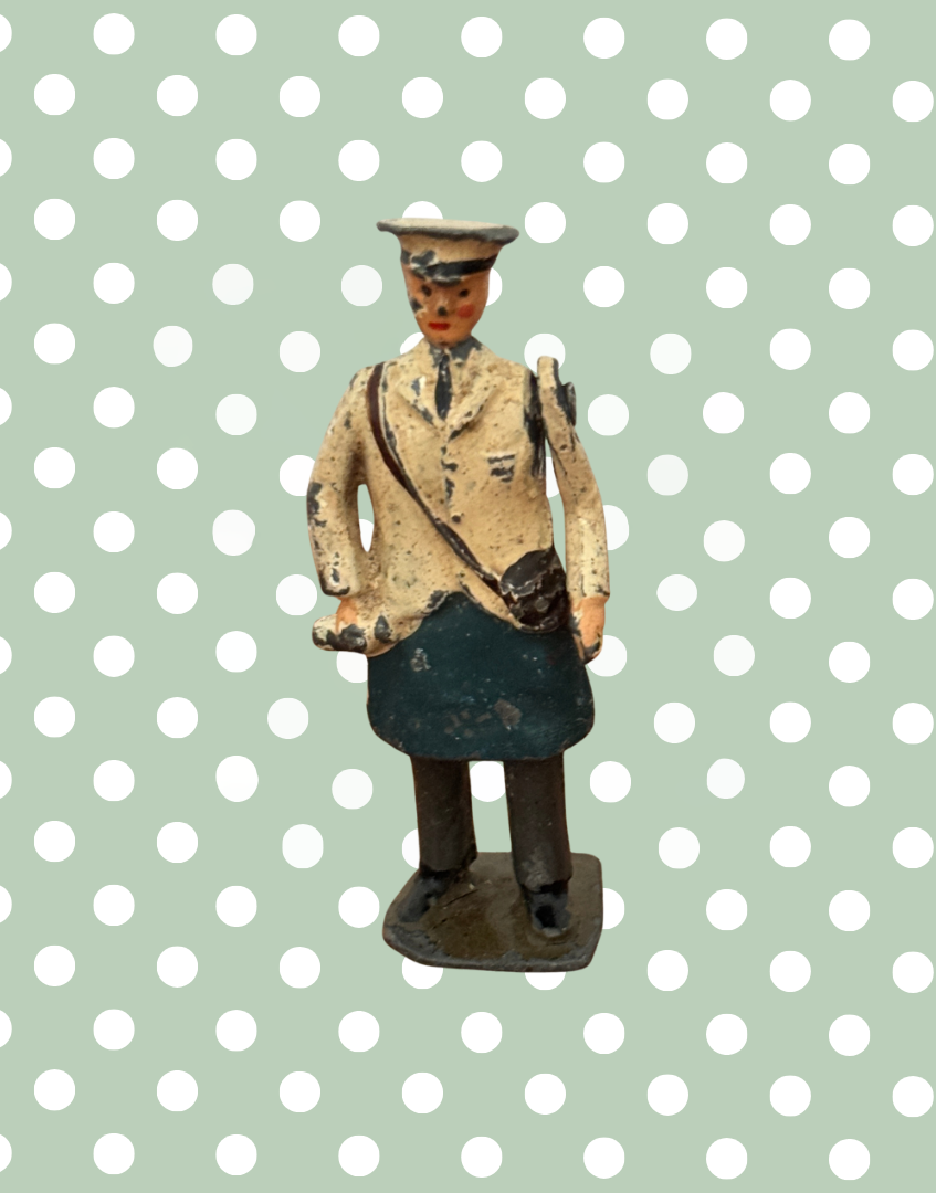 Britains milkman toy with moving arm detail close up