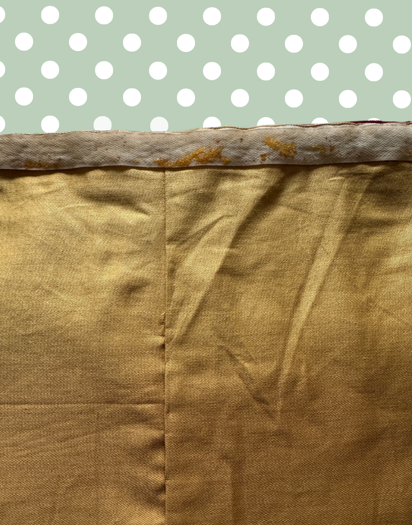Close up of adhesive track visible on the reverse lining of the later adapted antique pelmet.