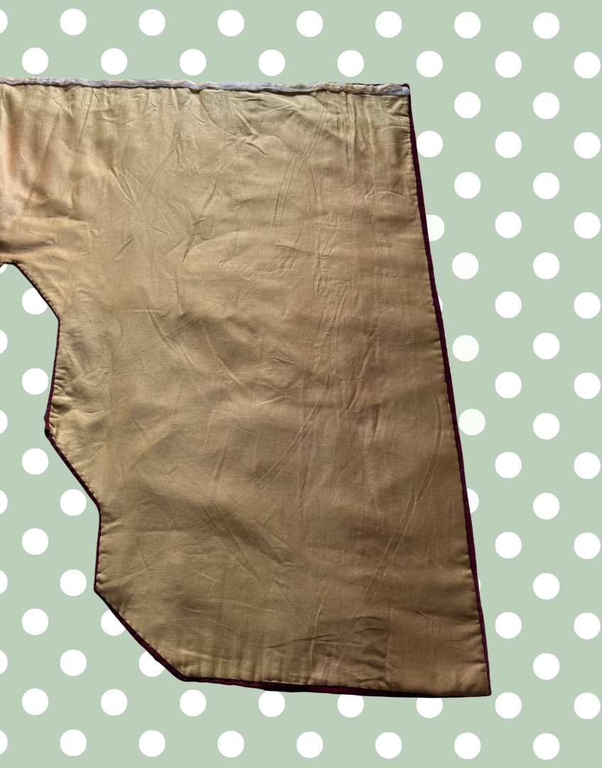 Reverse right section of the antique pelmet showing the protective lining and later adaptation of the original embroidered panel.