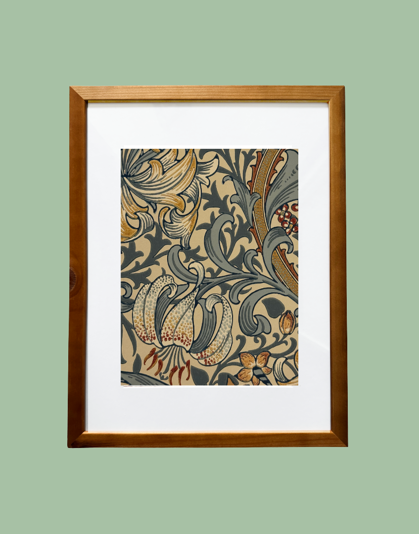 Framed artwork with William Morris floral pattern on a green background
