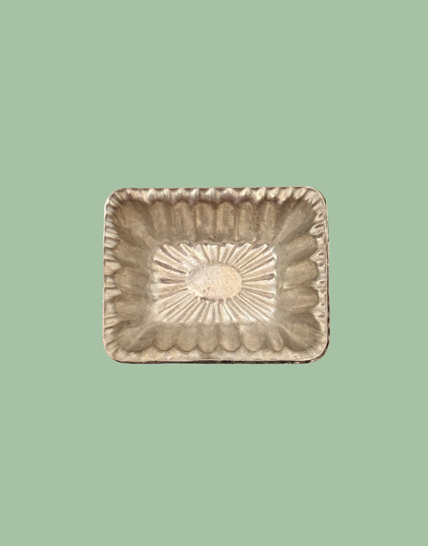 One out of a set of 10 identical vintage rectangular aluminium chocolate moulds with fluted sunburst design and original confectionery details