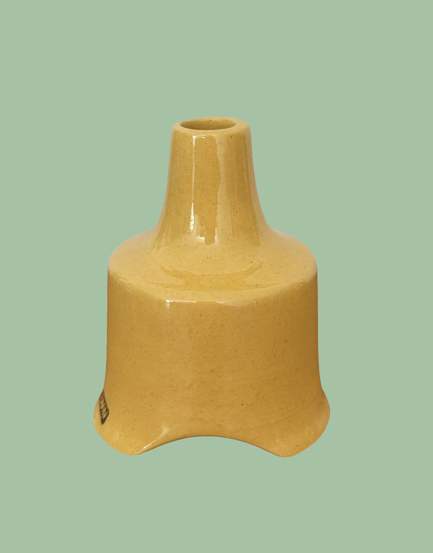 Side profile of vintage Nutbrown mustard yellow pie vent.