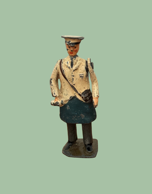 Britains milkman toy with moving arm detail close up