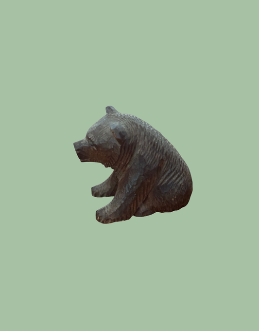 Vintage dark wood carved bear with rustic aged finish