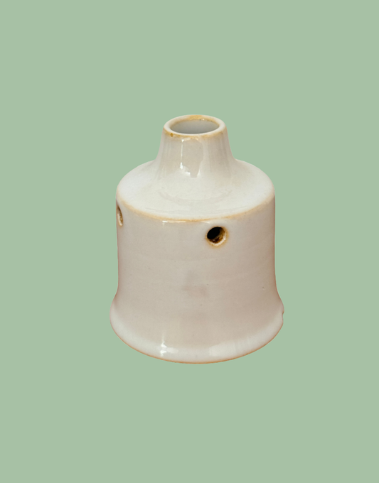 Rare vintage white ceramic pie funnel with classic steam vent design.