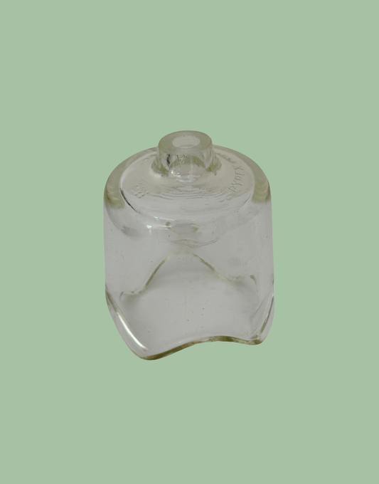 Vintage large Pyrex glass pie funnel for traditional home baking.