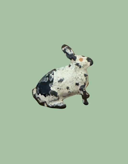 Miniature scale black and white hand painted rabbit collectable with pink 