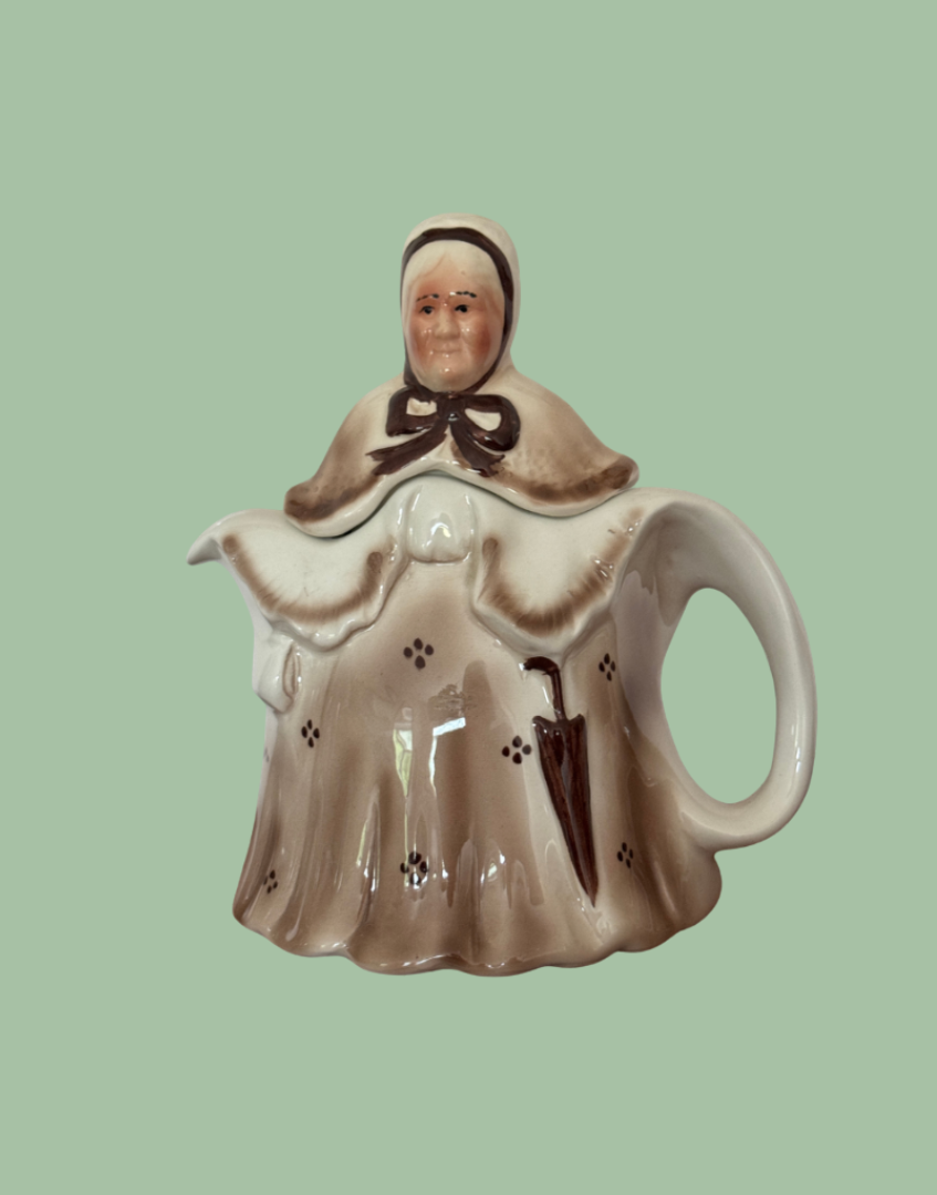 Vintage brown Tony Wood Staffordshire pottery Little Old Lady teapot with umbrella handle and bonnet detail front view