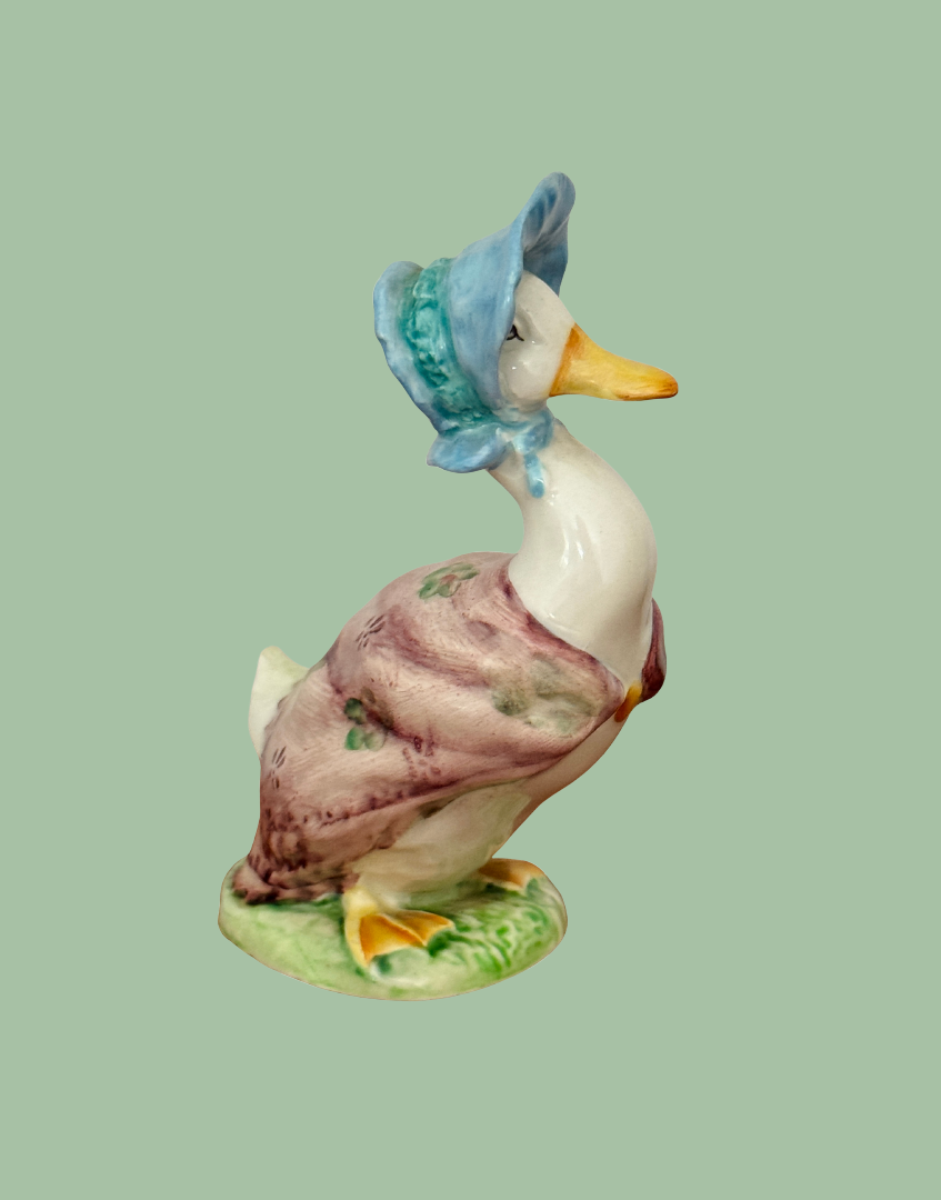 Vintage Jemima Puddle Duck Beswick figure viewed from the left side