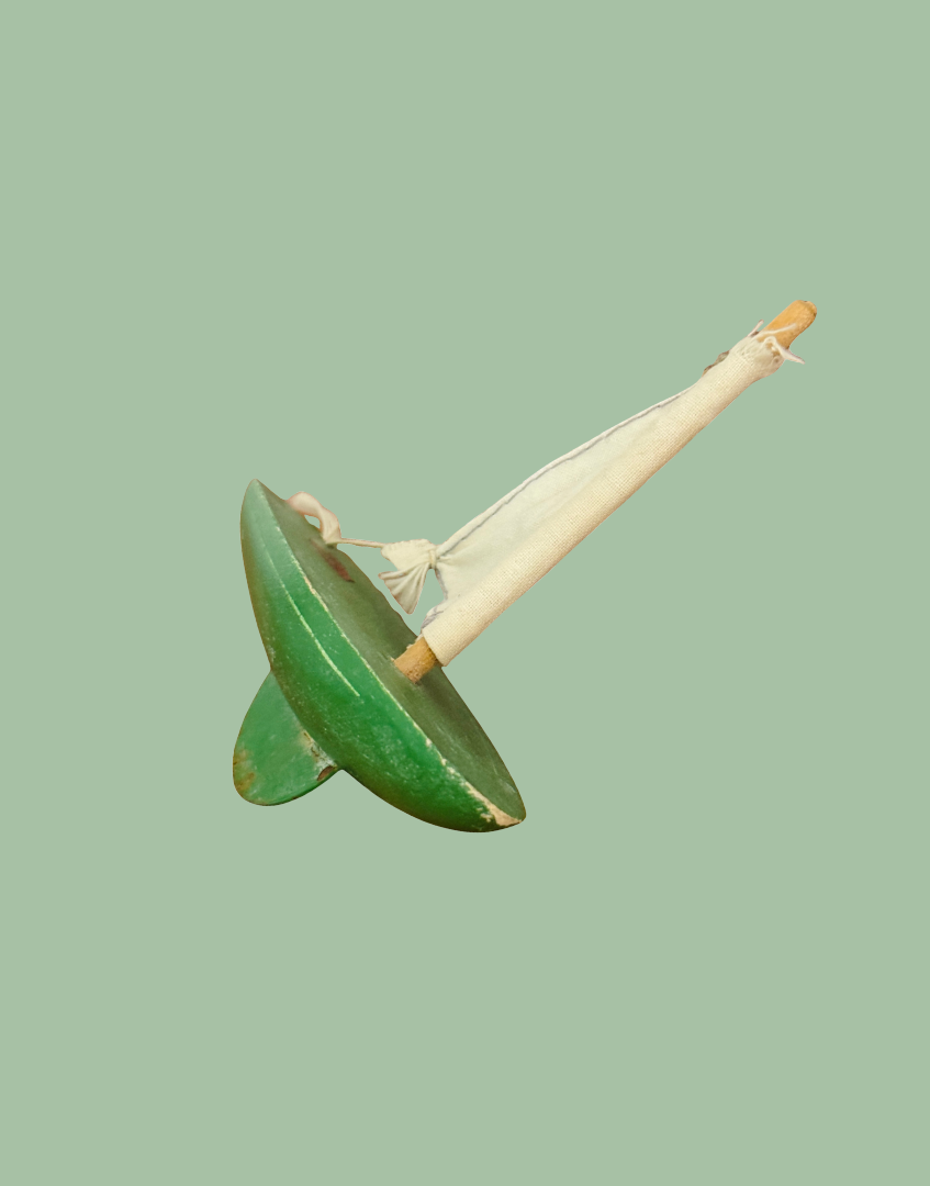 Rear underside view of the vintage green Star Yachts No. 0 pond yacht showing its original painted 