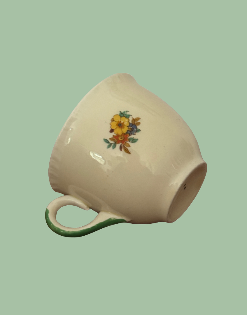 sweet pink and yellow floral illustration on vintage british pottery tea cup
