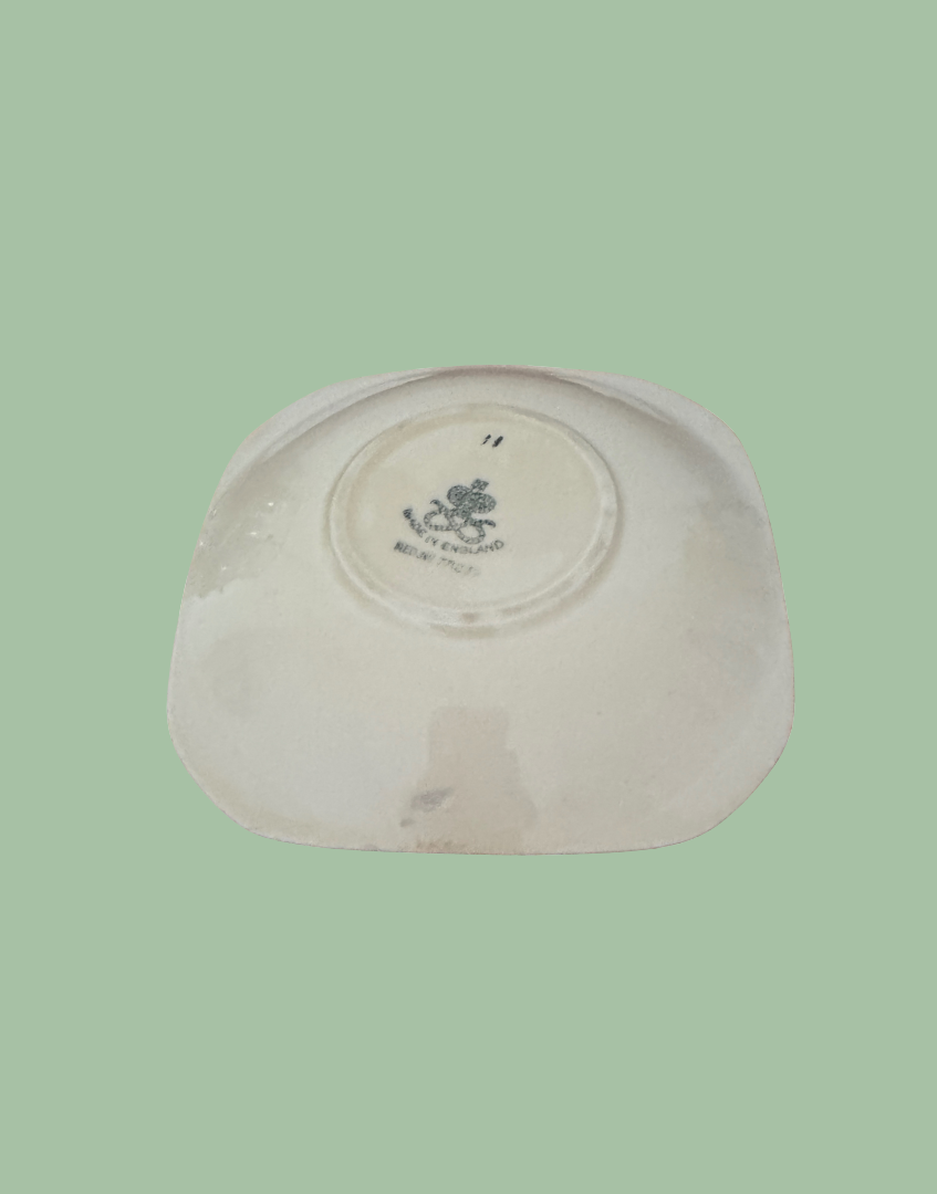 base of 1930s ceramic saucer with staffordshire knot stamp