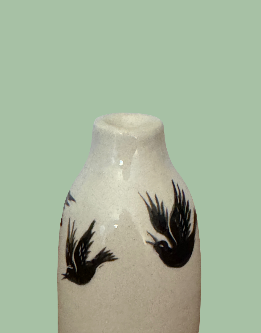Close Up of Stuart Bass Cream Pie Funnel with Black Bird Illustration