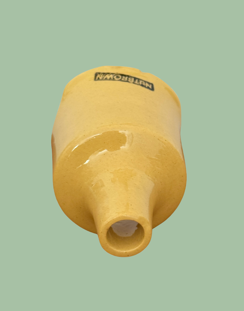 Top view of vintage Nutbrown ceramic pie vent.