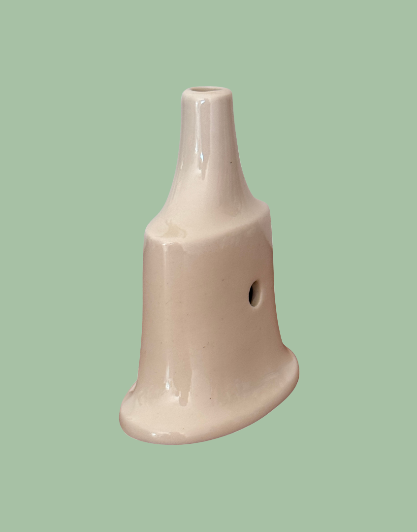 Back side view of traditional white ceramic pie vent collectable