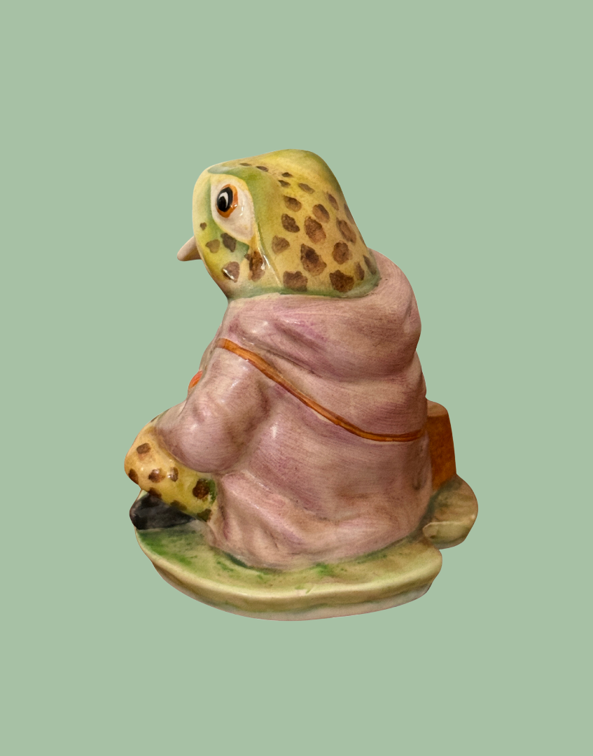 Three-quarter rear view of vintage Beswick Jeremy Fisher figurine showing hand-painted porcelain finish and modelling