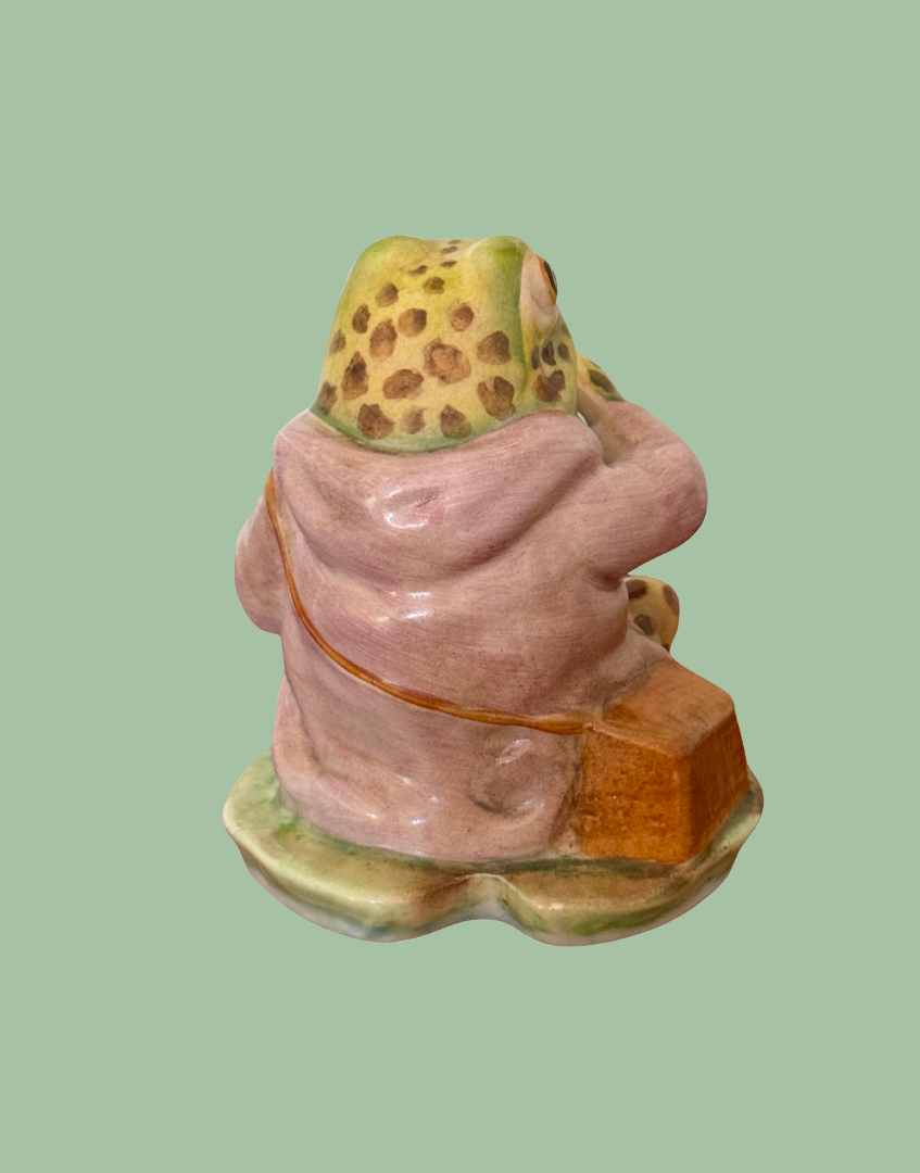 Rear view of Beswick Jeremy Fisher Beatrix Potter figurine showing the back of his lilac coat and detailed craftsmanship