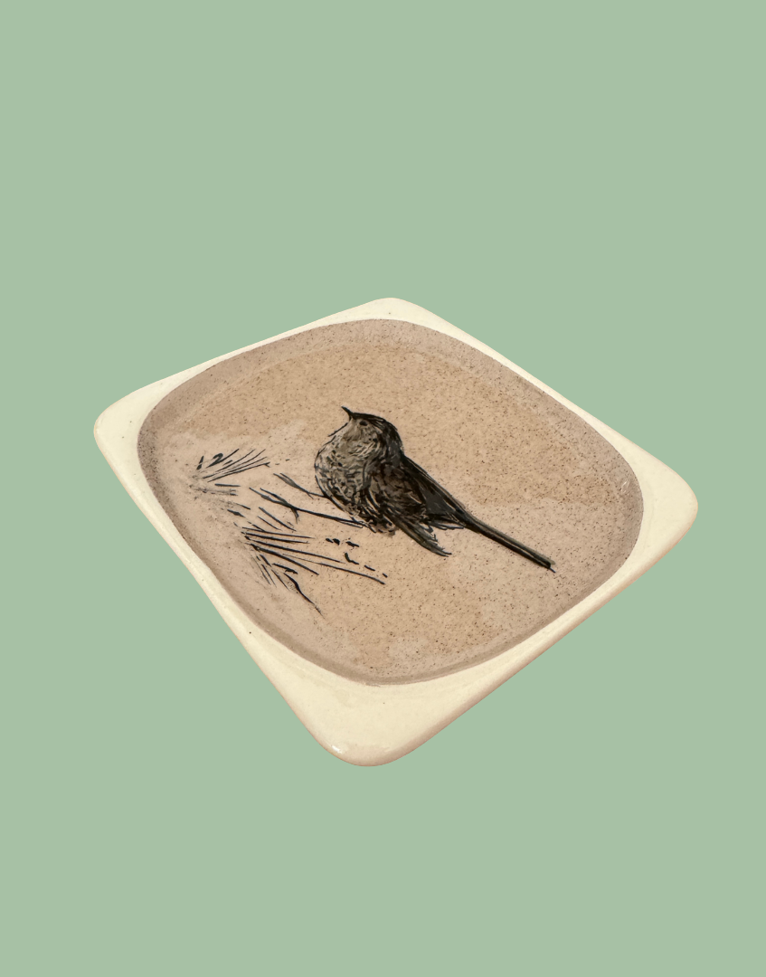 Side view of small bird design jewellery dish