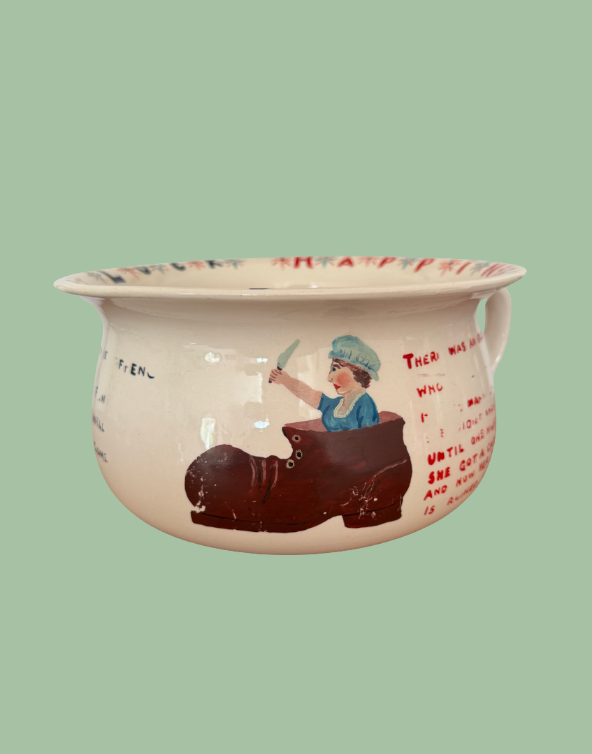 Side view of novelty ceramic chamber pot design