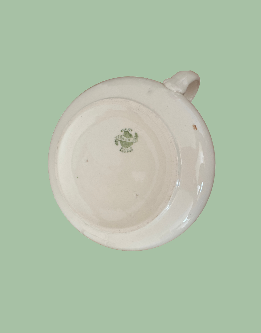 White ceramic chamber pot plantd view of base with makers stamp