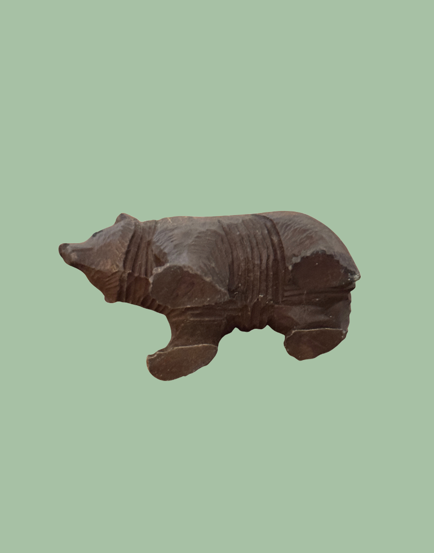 Small Black Forest bear carving base view underside detail