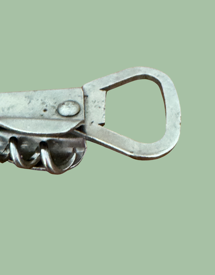 Bottle opener end detail vintage tool