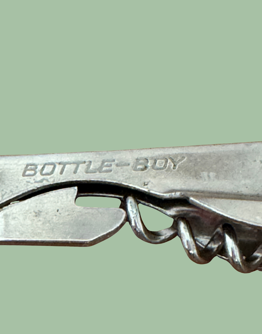Stainless steel bottle opener with 'Bottle Boy' branding
