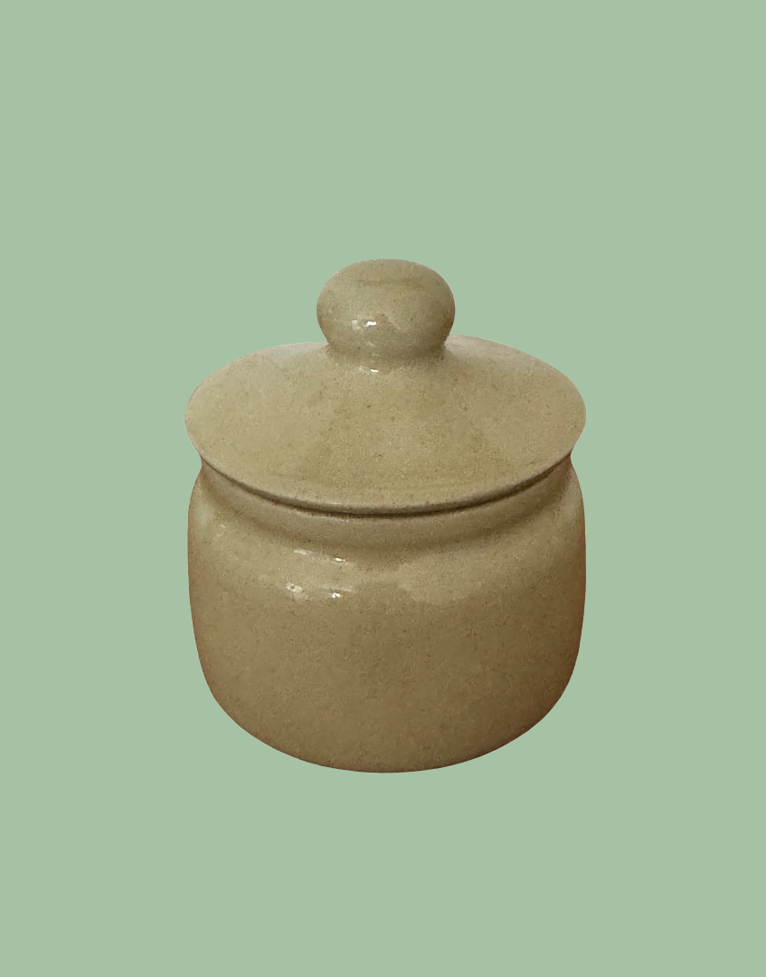 reverse view of vintage kitchenware collectable mustard pot
