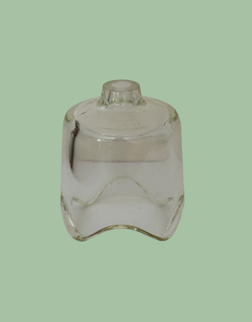 Side profile of vintage Pyrex glass pie funnel.