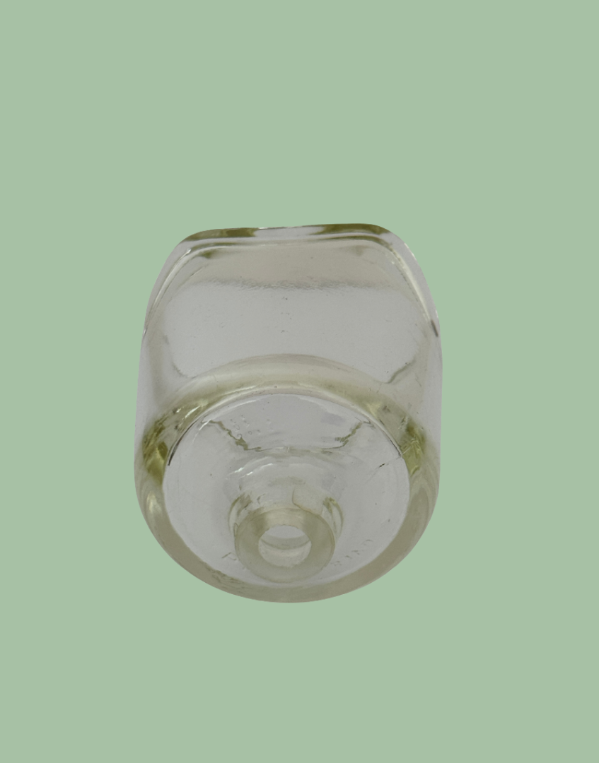 Top opening of vintage Pyrex glass pie funnel.
