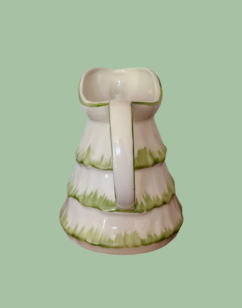 Back view of Tony Wood Little Old Lady green jug with character handle and spout detail