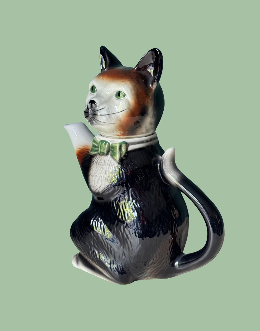 Side view of characterful Tony Wood Staffordshire pottery cat teapot 