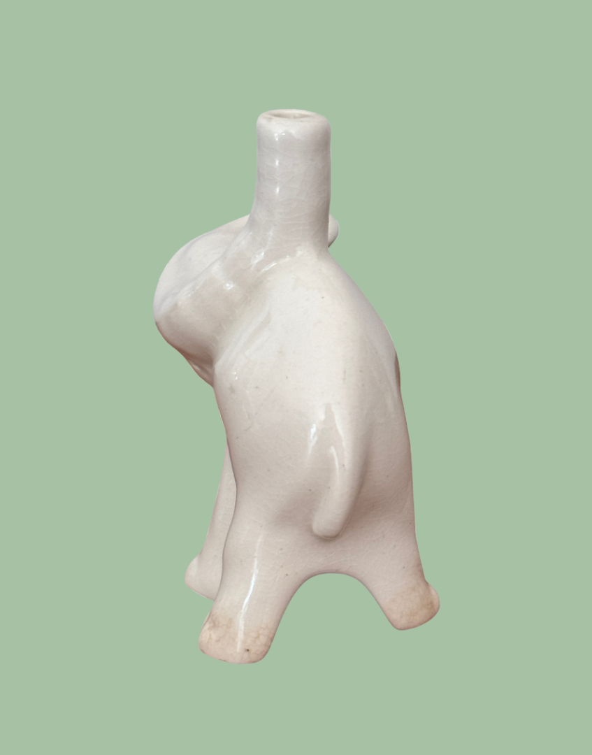 back view of white elephant ceramic baking tool