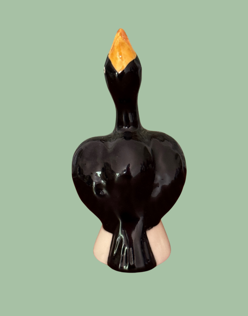 Reverse view of vintage pie bird collectable ceramic baking tool